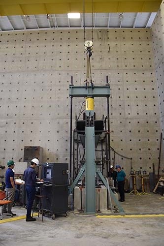 Preliminary results of the first of six physical tests on coupled steel-plate composite shear-wall specimens indicate excellent behavior and cyclic performance. (Photo: AISC)