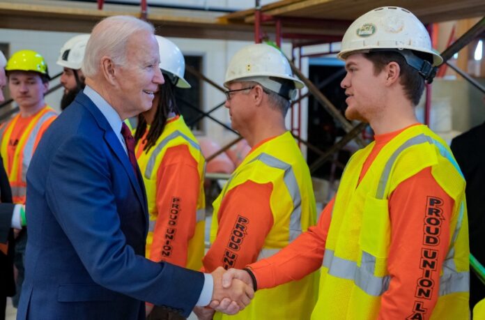 biden with construction workers