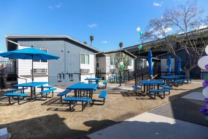 LA kicks off new year with ribbon cutting at housing complex with 100 units